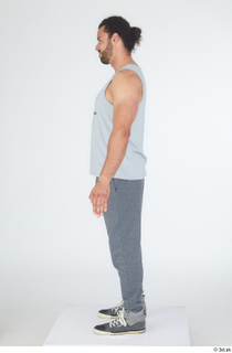 Simeon dressed grey joggers grey sneakers grey tank top sports…